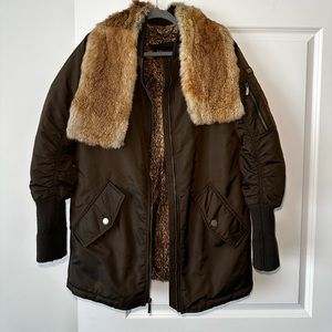 Coat has been in storage for a while, but still in great condition!
